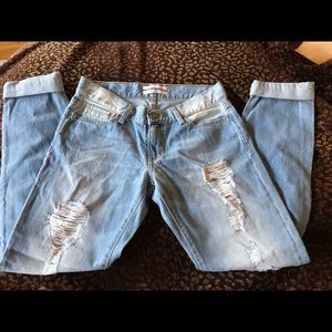 Etienne Marcel double red zipper distressed jeans.